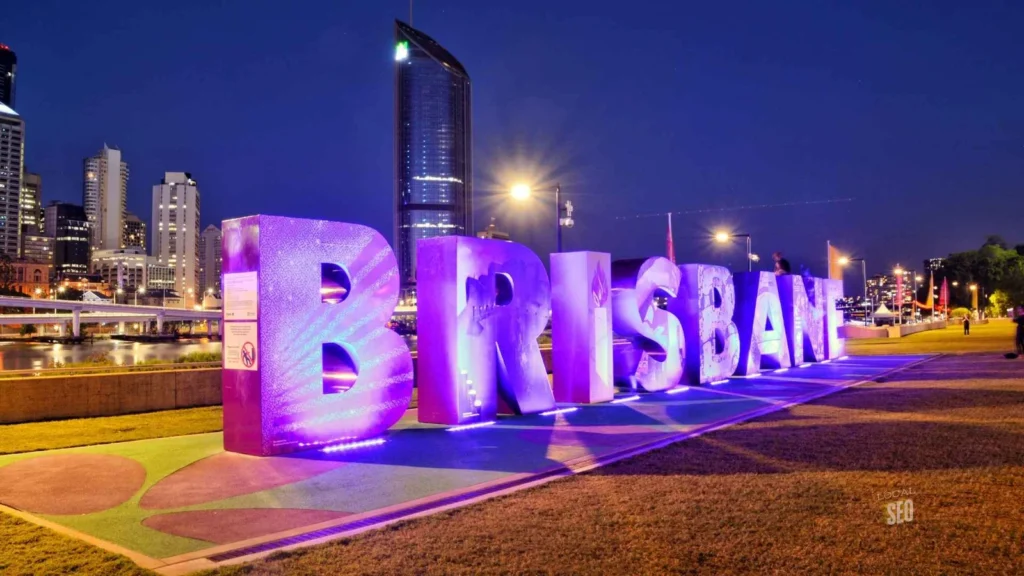 Illuminated Brisbane sign at night