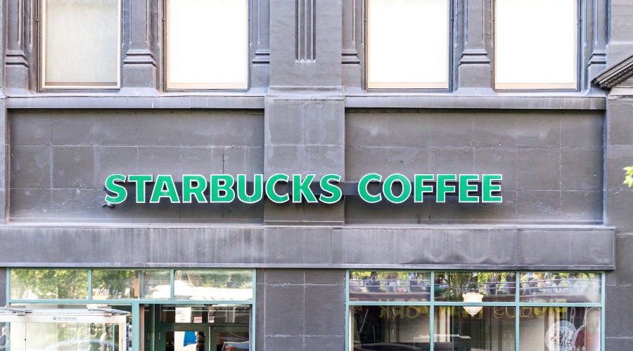 Starbucks Coffee storefront exterior with logo