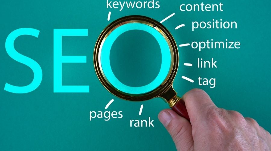 SEO concepts with magnifying glass and keywords