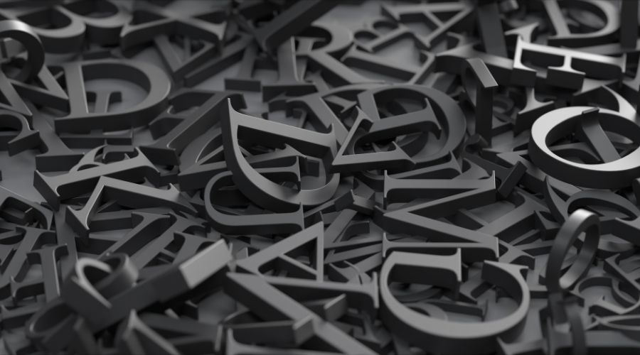 Scattered 3D black letters, typography concept.