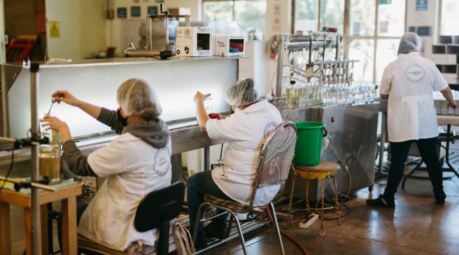 Workers in a fragrance production facility.