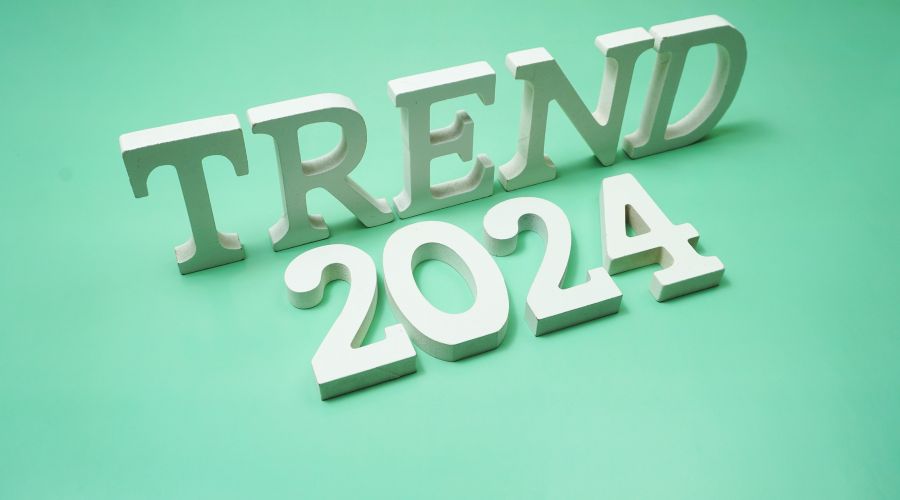 Trend 2024 in white letters on green background.