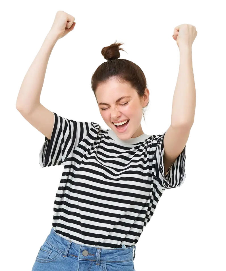 Excited woman celebrating with raised arms.