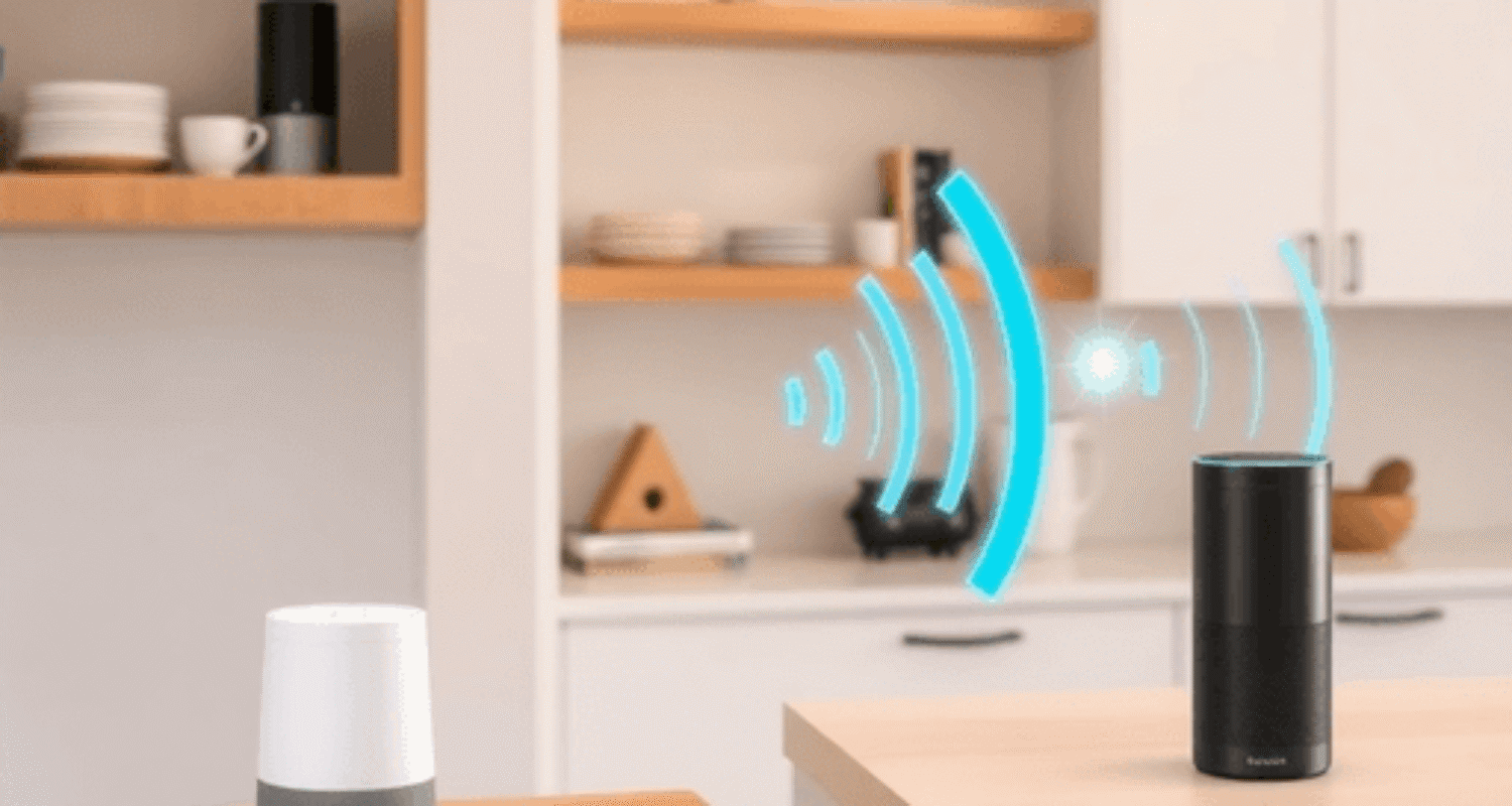Modern home interior with smart speakers on shelves and countertops, digital voice wave graphics symbolizing voice search technology.